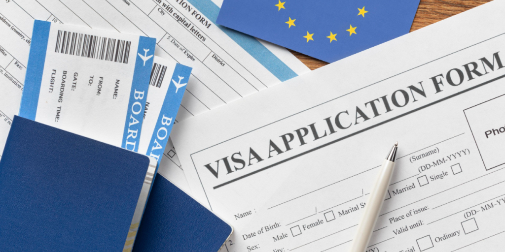 Visa application documents including passport, boarding passes and application form